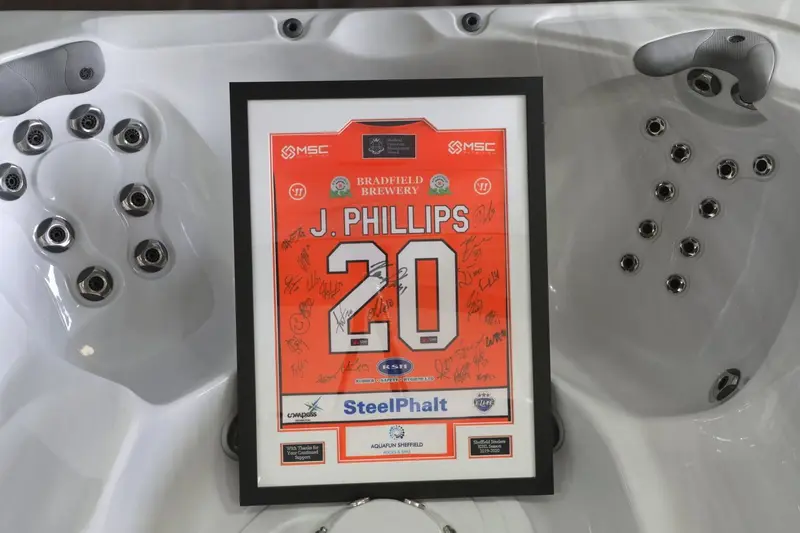 Signed football shirt displayed in a hot tub at Aquafun Sheffield
