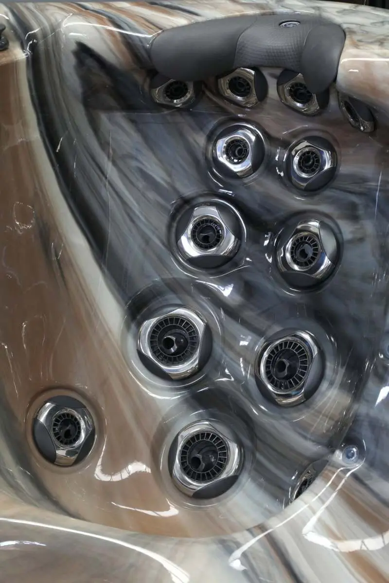 Close up of hot tub massage jets in a marble effect shell Aquafun Sheffield