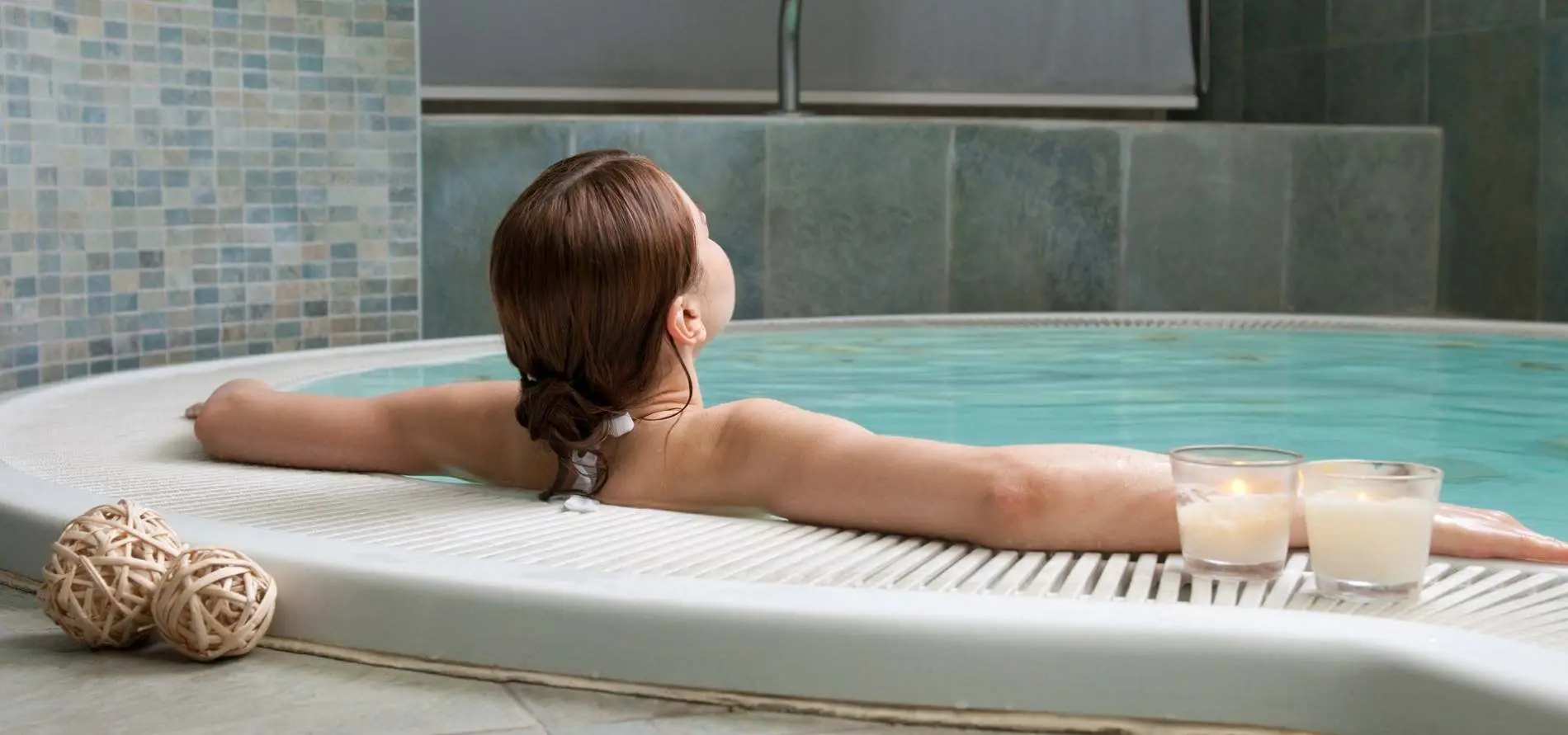 Woman relaxing in a hot tub Aquafun Sheffield