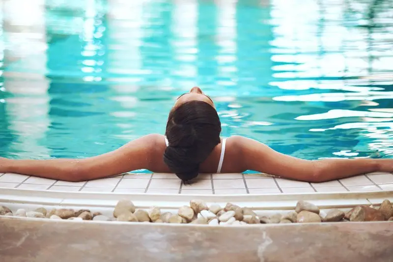 Woman relaxing at the edge of a swim spa Aquafun Sheffield
